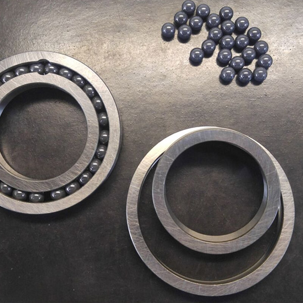 A pair of full complement bearings, also known as max type bearings, with ceramic balls.